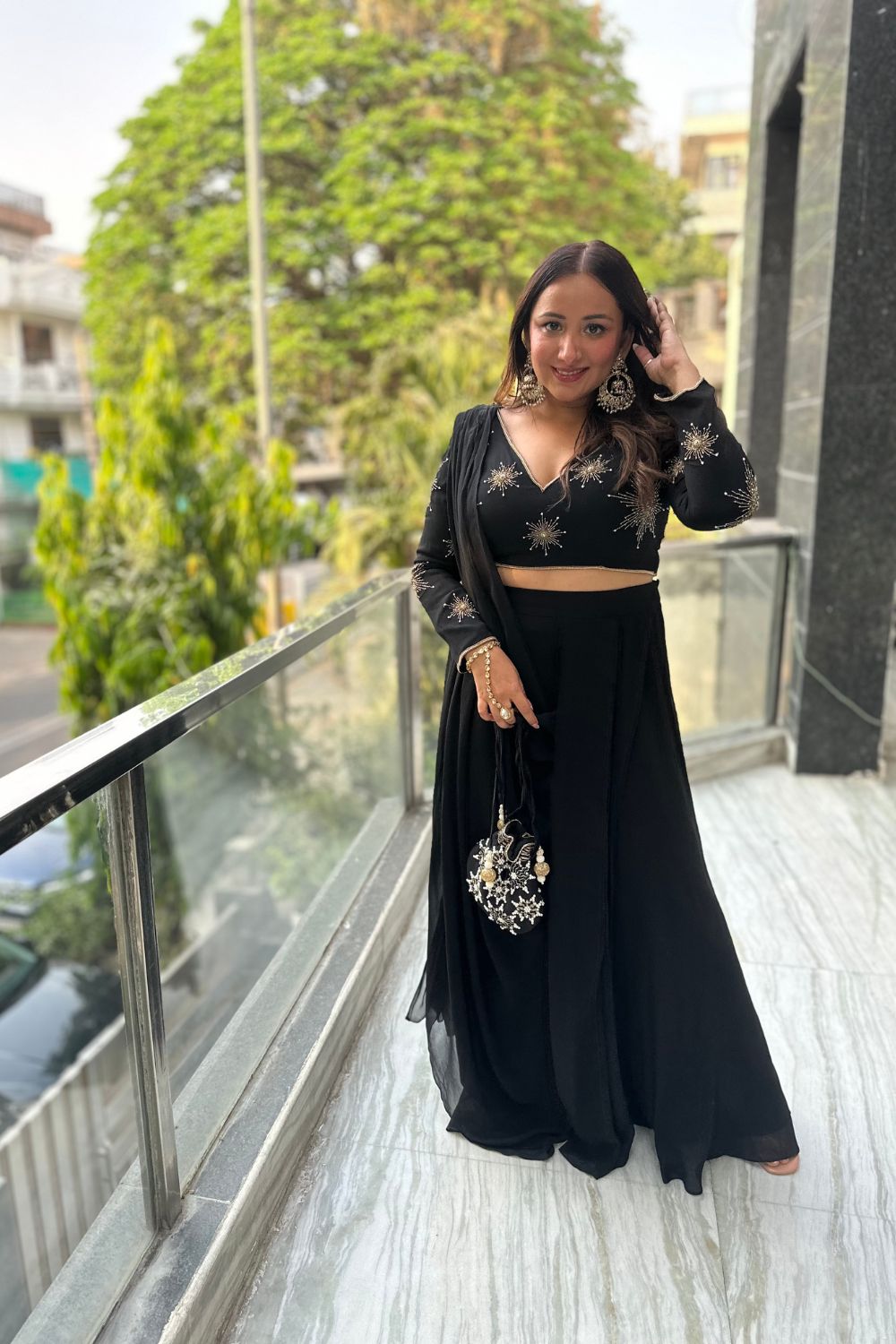 Rubi bhatiya styled in black drape saree from sitara collection
